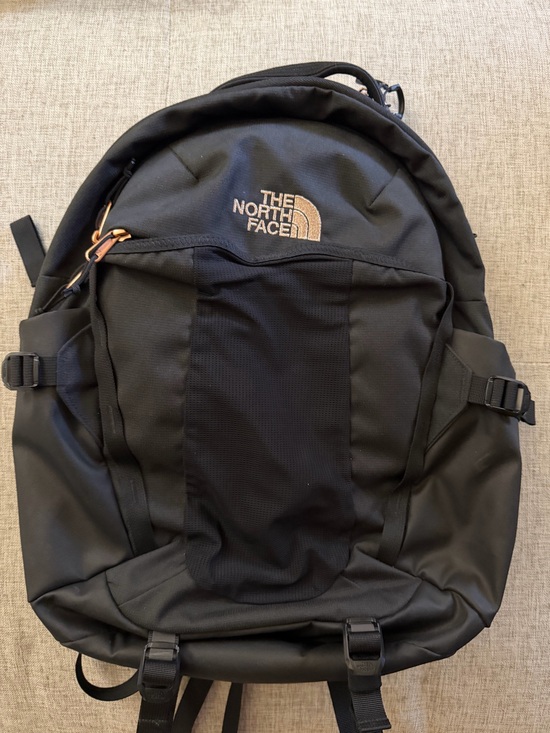 The North Face Handbags - The North Face Black Backpack with Tan Logo Accent